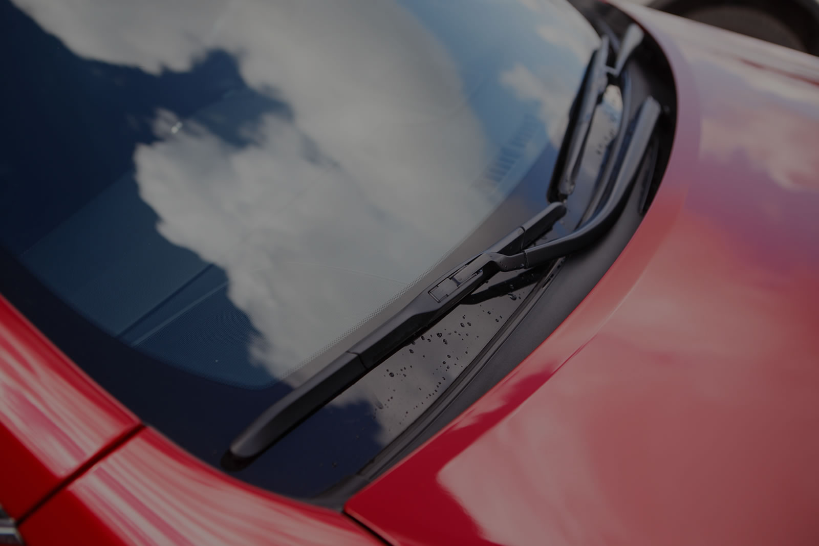 Close-up of a vehicle windshield, where the ADAS camera is mounted